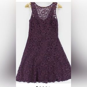 Plum knee-length sleeveless lace overlay bridesmaid dress
